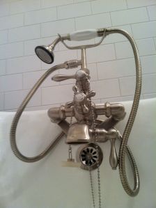 Our tub spout and hand shower - it almost takes a manual to use!